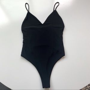 Simple and stretchy black bodysuit.